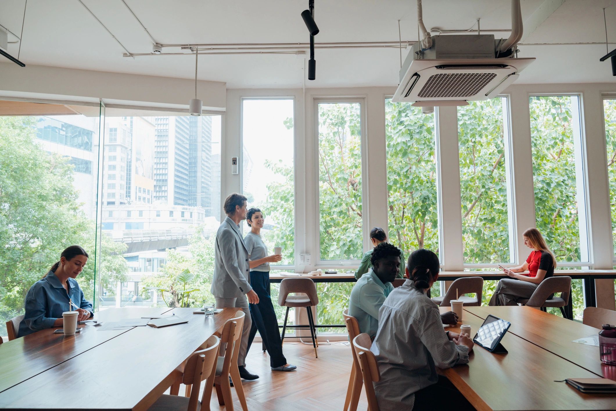 Business professionals collaborating in a modern accessible workspace
