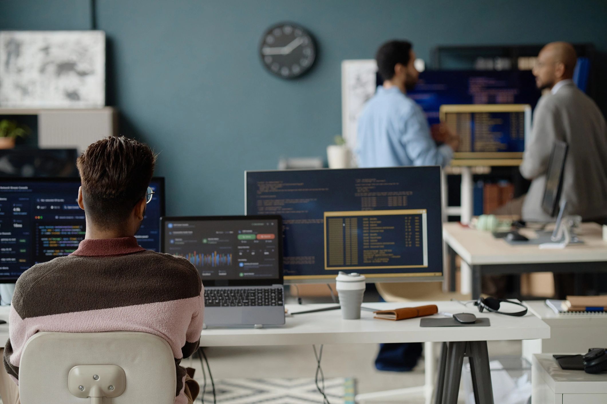 IT professionals collaborating in a technology office